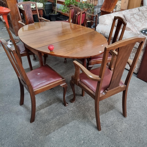 933 - Star Lot : A stunning seven piece dining suite -  comprising of an extendable oval dining table with... 