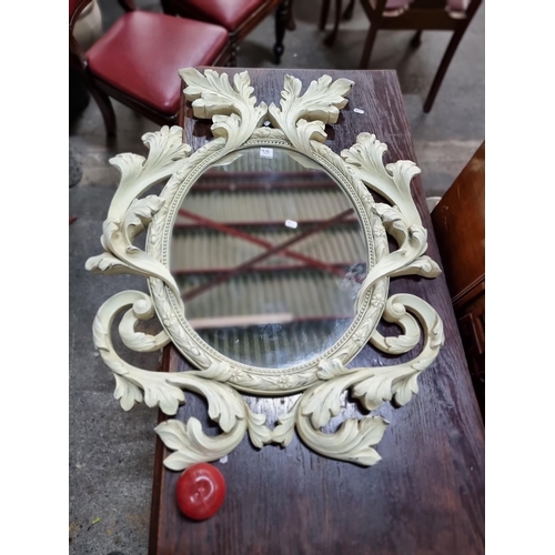 939 - An impressive Rococo style wall mirror with a large elaborate frame. A lovely example with elaborate... 