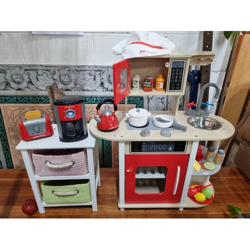 940 - A fabulous children's toy kitchen. This is a truly adorable set crafted from wood with rounded safet... 