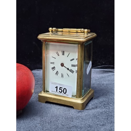 150 - Star Lot : A beautiful example of an antique mechanical French made carriage clock with a brass fram... 