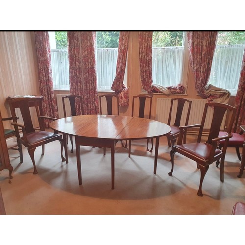 933 - Star Lot : A stunning seven piece dining suite -  comprising of an extendable oval dining table with... 