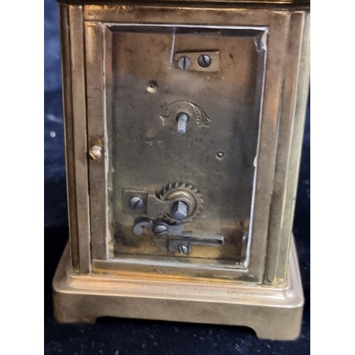 150 - Star Lot : A beautiful example of an antique mechanical French made carriage clock with a brass fram... 
