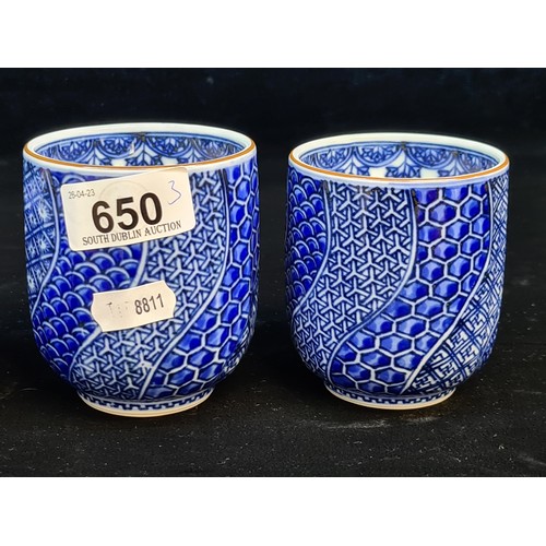 650 - A trio of Chinese porcelain vessels. Including a pair of Yunomi cups with a Wagara blue glaze transf... 