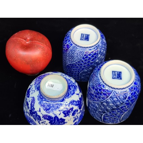 650 - A trio of Chinese porcelain vessels. Including a pair of Yunomi cups with a Wagara blue glaze transf... 