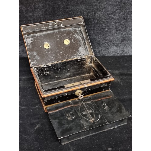 225 - A heavy and secure metal cash box with a removable tray to interior holding three compartments. Orig... 