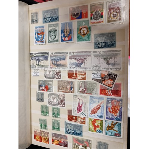 224 - A large collection of vintage postage stamps of Russian and worldwide origin including examples comm... 