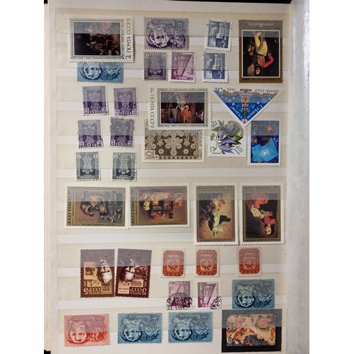 224 - A large collection of vintage postage stamps of Russian and worldwide origin including examples comm... 