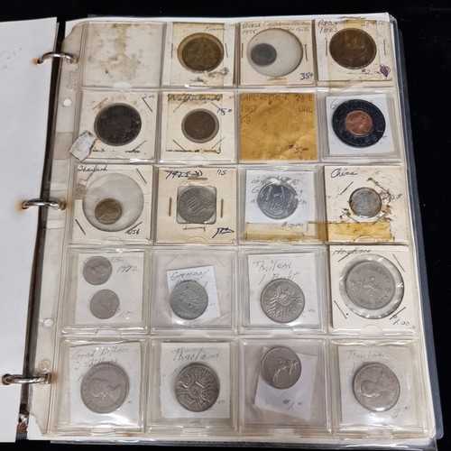 230 - A coin album of over 230 coins with their corresponding information booklets. Includes antique and v... 