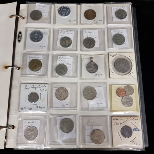 230 - A coin album of over 230 coins with their corresponding information booklets. Includes antique and v... 