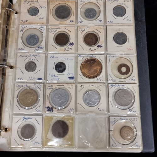 230 - A coin album of over 230 coins with their corresponding information booklets. Includes antique and v... 