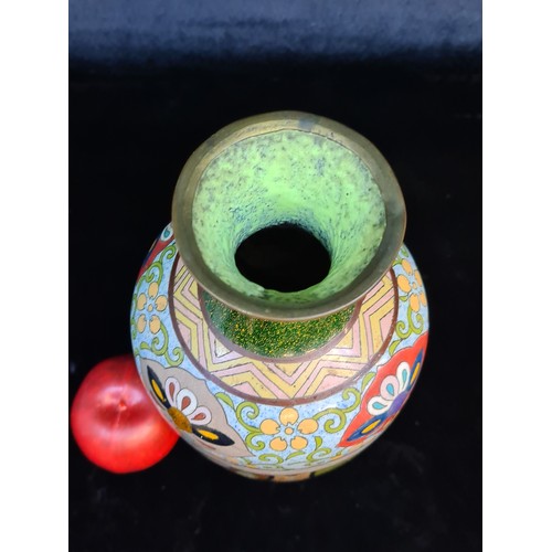 676 - Star lot : A fabulous rare Chinese cloisonné vase. Decorated with beautiful richly toned enamels, wi... 