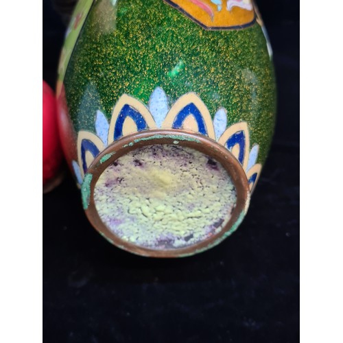 676 - Star lot : A fabulous rare Chinese cloisonné vase. Decorated with beautiful richly toned enamels, wi... 