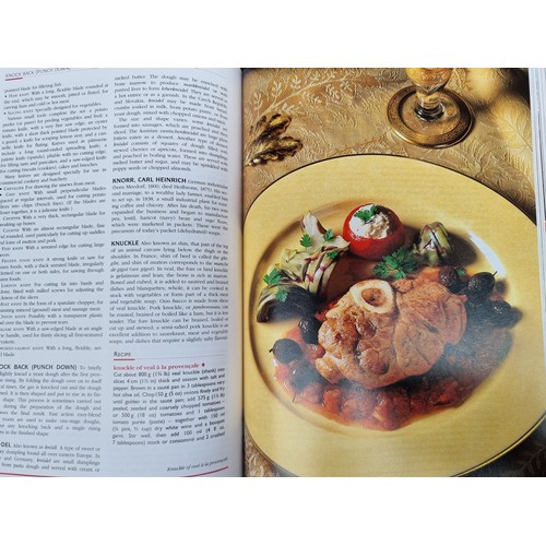 304 - A hardback cookery encyclopedia book titled 'Larousse Gastronomique'. With a hardback cover and orig... 