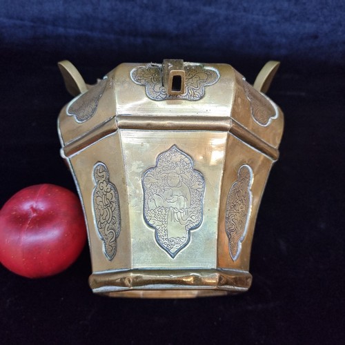 681 - Star Lot : A very heavy brass Chinese teapot, circa 1850. Featuring a series of recessed panels with... 