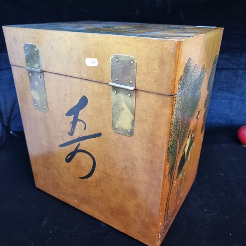 701 - A large Chinese inspired storage chest. Featuring a rich golden stain and a peaceful scene of schola... 