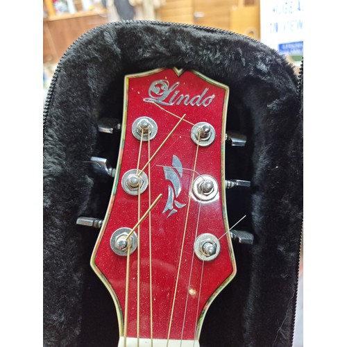 461 - A Lindo custum guitar, model ORG-SL-RD with a flaming heart motif to the red ombre finish. With a so... 