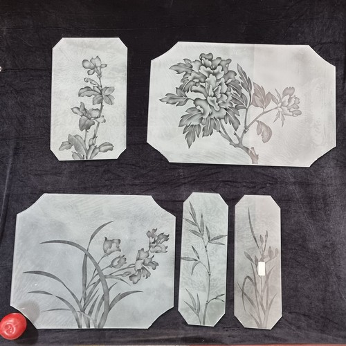 725 - Five pieces of ornamental frosted glass with bamboo and other floral design.