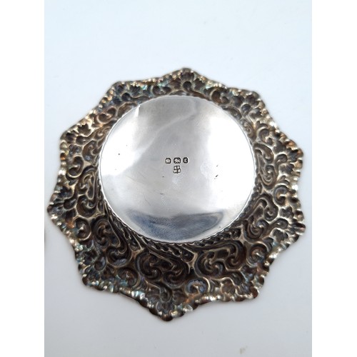 7 - A stunning example of a sterling silver antique pin dish, this dish features profuse foliate surroun... 