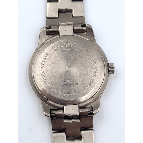 14 - A handsome example of a Tissot P.R 50 Titanium Swiss made wrist watch. This watch features luminous ... 