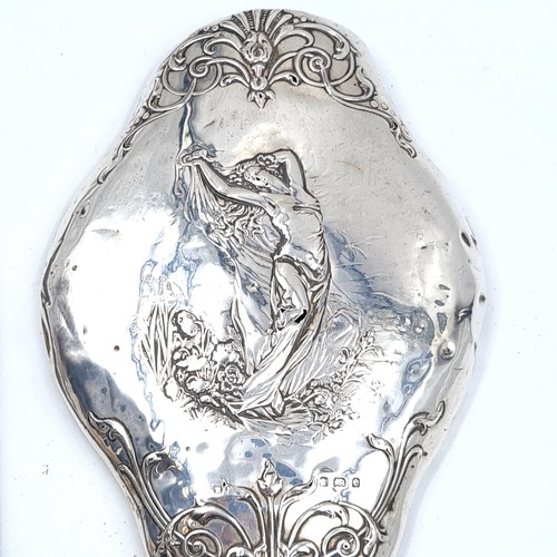 19 - A fabulous duo of sterling silver items, consisting of a sterling silver handled boot hook (hallmark... 