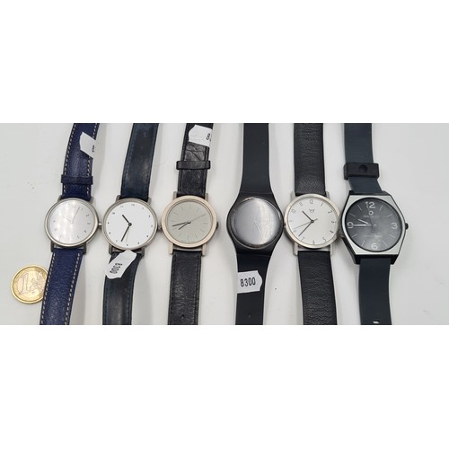 20 - A collection of six modern wrist watches, of light weight metal and features an array of stylish des... 
