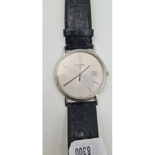 21 - Star Lot : A handsome Longenes of Switzerland gentleman's wrist watch, featuring a leather strap and... 