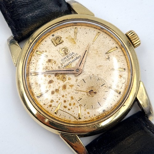 28 - Star Lot : A vintage Swiss made Omega automatic Sea master gentleman's wrist watch. Set with a baton... 