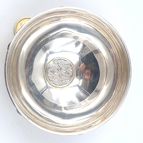 53 - Star Lot: A fabulous example of a heavy Irish silver graduated bowl, set with a circular base and fe... 