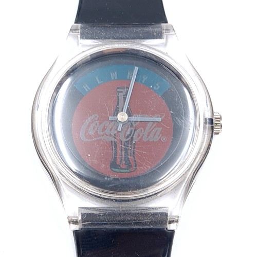 55 - Two Coco Cola collectable wrist watches, including an X.T-1 sport example which is encased.