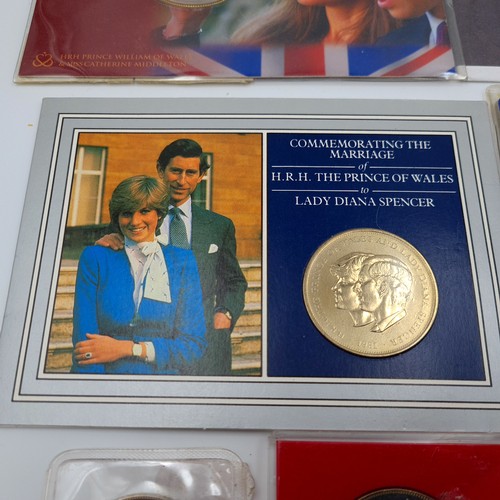 504 - A collection of eight Royal Family commemorative coins and medallions. Together with a London Olympi... 