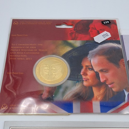 504 - A collection of eight Royal Family commemorative coins and medallions. Together with a London Olympi... 