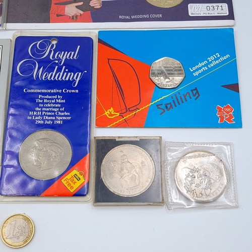 504 - A collection of eight Royal Family commemorative coins and medallions. Together with a London Olympi... 