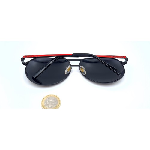 516 - A pair of aviator police sunglasses, with police marked to red detail stems. In very good  condition... 