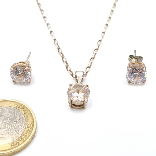 543 - A beautiful suite of jewellery, comprising of a Zircon sterling silver necklace. Together with a pai... 