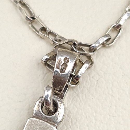 544 - A very attractive sterling silver pendant cross and chain, set with incised detail. Chain length: 54... 