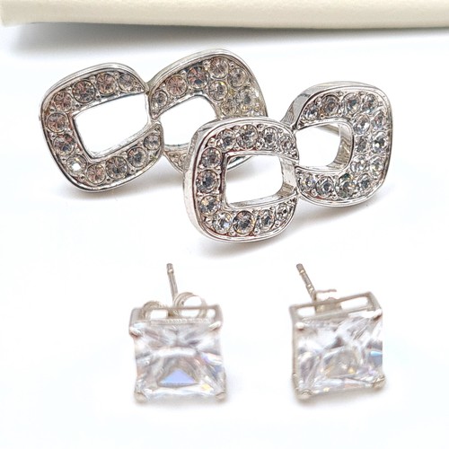 549 - A large and assorted collection of sterling silver gem set stud earrings, in an array of styles of d... 