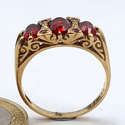 567 - Star Lot: A lovely  Victorian 9 carat gold three stone Garnet ring, set with beautiful Garnet and fo... 