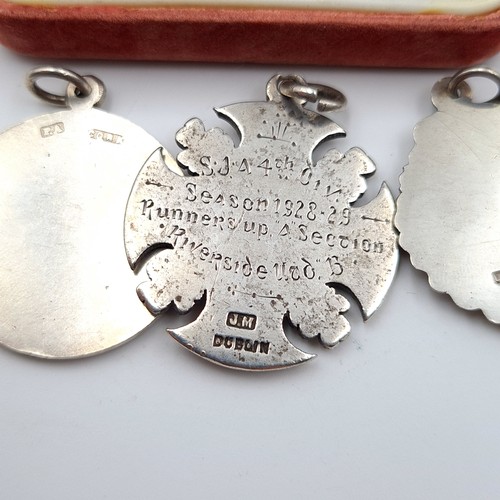 571 - An interesting collection of five hallmarked silver medallions, two with gold inlay and each relatin... 