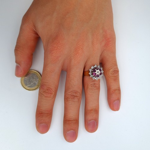 569 - Star Lot: A 9 carat gold wide band Ruby and and single cut Diamond cluster ring. This stunning ring ... 