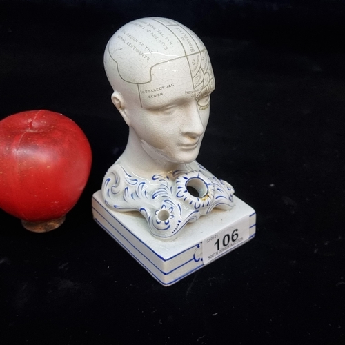 106 - A ceramic 19th century Phrenology bust pen-stand. This charming example features a phrenology bust w... 