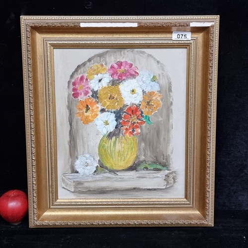 75 - A delightful original oil on board painting featuring a brightly coloured bouquet of flowers set in ... 