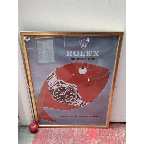 Star lot : A large print of a poster advertising Rolex. With the classic submariner wrapped around a large fish. Iconic poster.