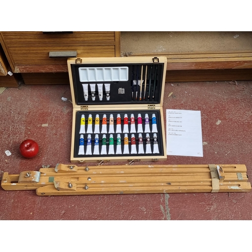 408 - Two art related items including a vintage Winsor & Newton easel with adjustable height. Along with a... 