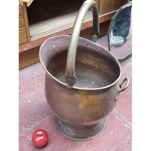 410 - A wonderful large twice the normal size  antique copper and brass hand hammered coal scuttle with a ... 