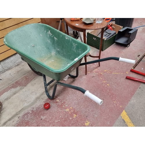 428 - A good quality wheel barrow by the brand Fort. With a PVC container to top and a rubber wheel. RRP: ... 