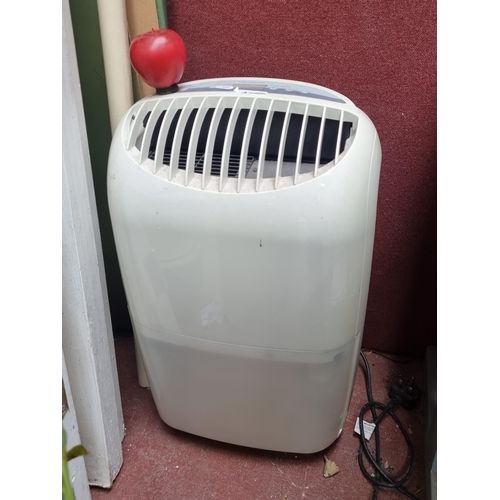 433 - A portable dehumidifier by the brand Get, model number: DHMD203. Similar with RRP of $209 on amazon.... 