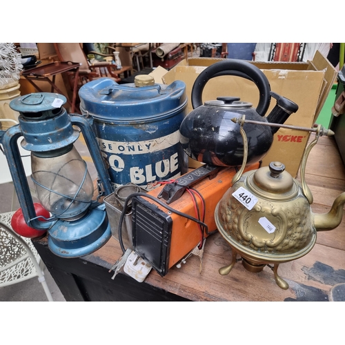 440 - Six items including a brass spirit kettle, an Esso Blue paraffin can, a vintage hurricane lamp and a... 