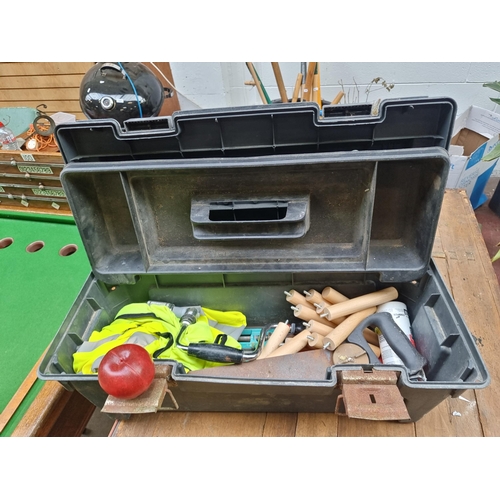 444 - A large heavy duty tool box with a removable tray compartment, two hand saws including a Peugeot exa... 