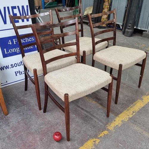 450 - A set of four fabulous Mid Century Modern Danish dining chairs with rosewood frames, delicate curved... 