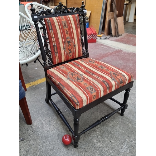 451 - A fantastic antique Jacobean style occasional chair with elaborate carved scroll and foliate detaili... 